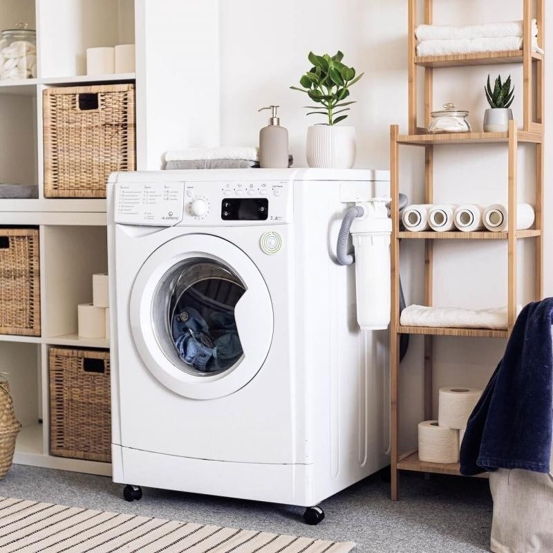 White washing machine in a laundry room